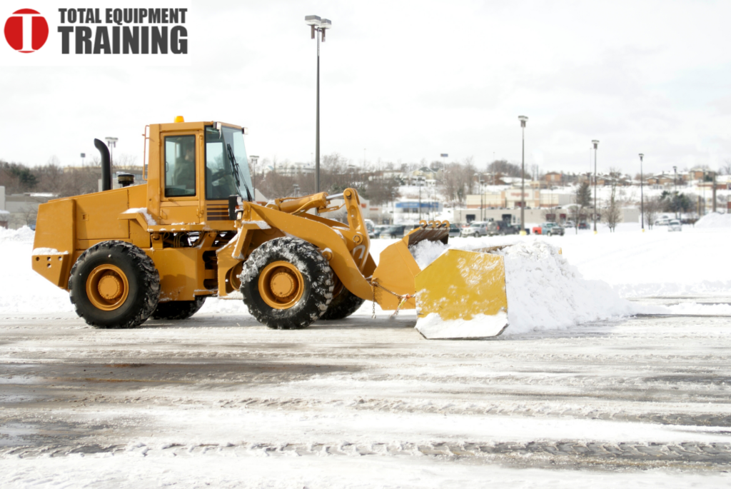 Backhoe for snow removal